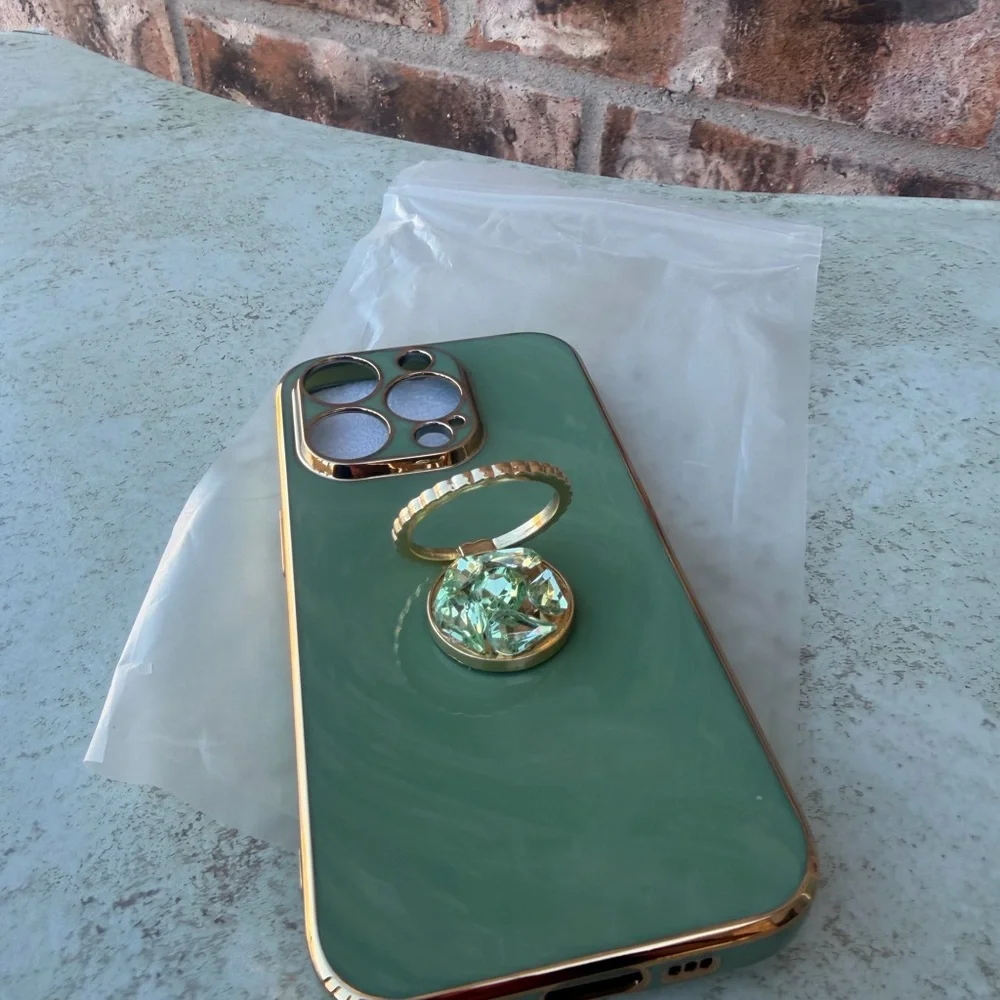 Green iPhone 14 Pro Case with Gold Accents